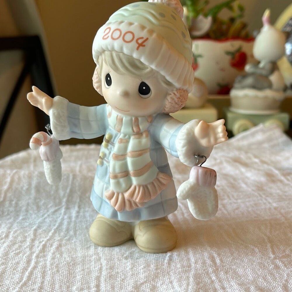 Vintage 2004 Precious Moments. Playing in the snow with dangle mittens figurine